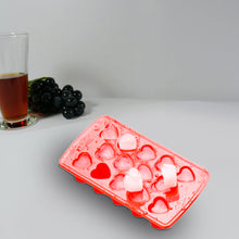 Heart-shaped silicone ice cube tray, enhances drink presentation.