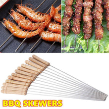 Detailed view of BBQ skewers with wooden handles.