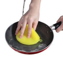 Non-stick silicone scrubber sponge, resistant to heat and mildew.